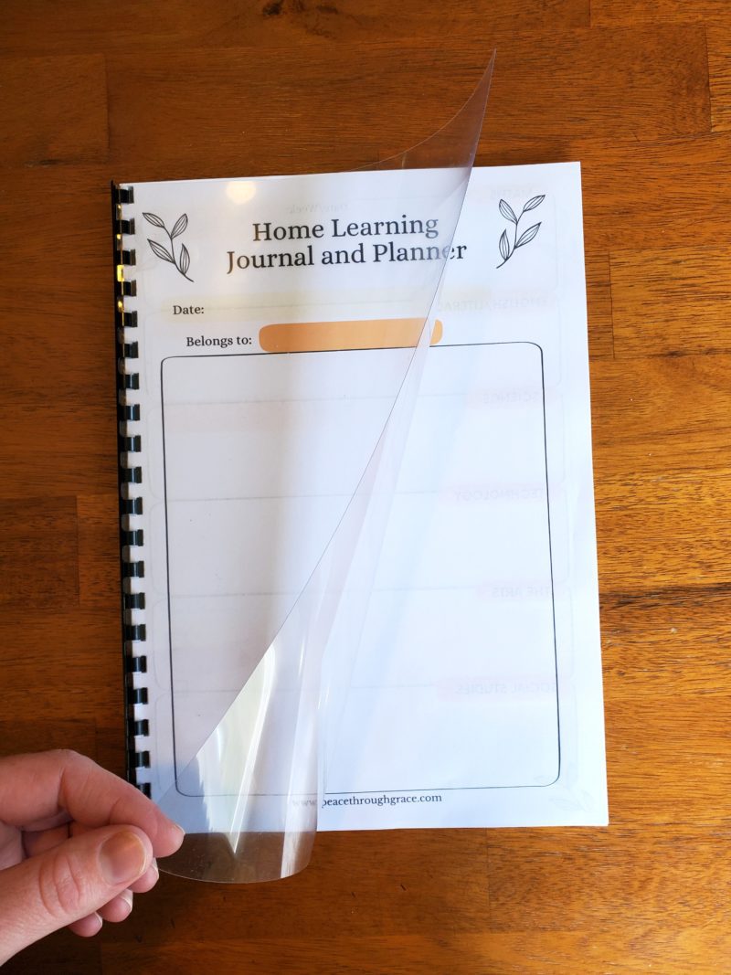 Features a Clear Plastic Cover (protects the front) front page of the planner